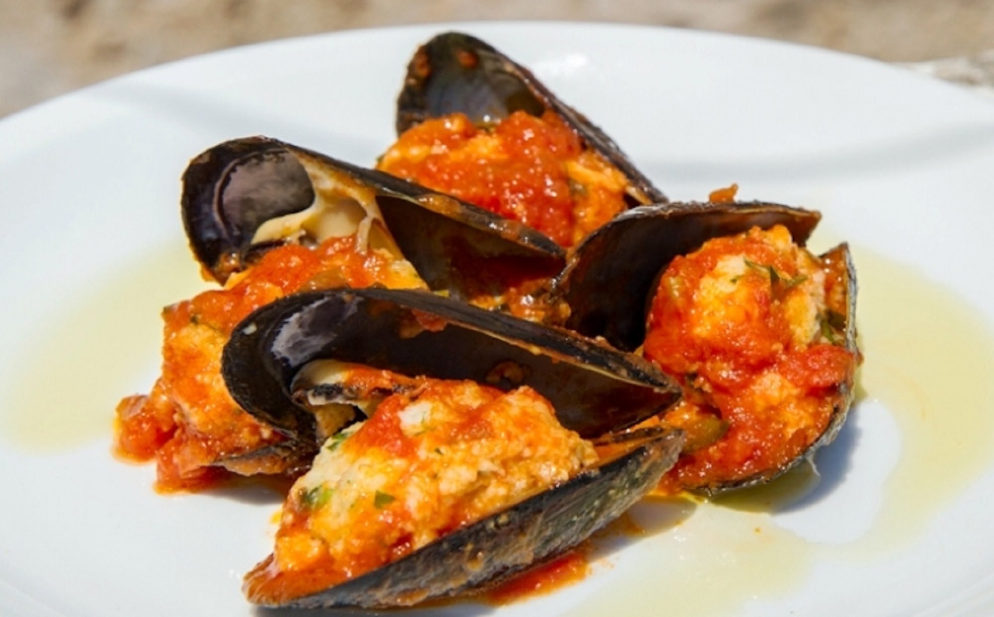 Cozze ripiene al sugo