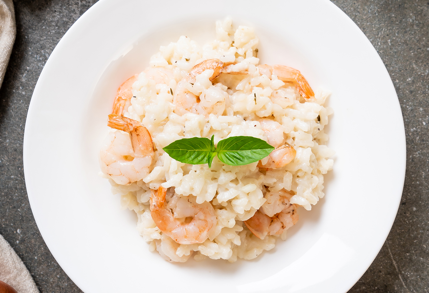 Risotto all’arancia con pesce spada e gamberetti